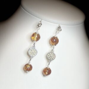 Silver earring with amber-ash beads